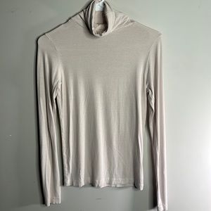 Light pink turtle neck shirt
